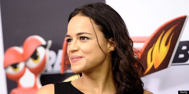 NEW YORK, NY - JULY 09: Actress Michelle Rodriguez attends the 'Turbo' New York Premiere at AMC Loews Lincoln Square on July