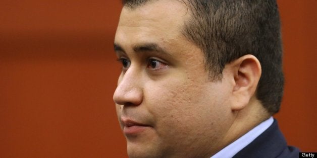 George Zimmerman leaves the courtroom during a recess in his trial at Seminole circuit court in Sanford, Florida, Friday, July 12, 2013. Zimmerman has been charged with second-degree murder for the 2012 shooting death of Trayvon Martin. (Pool photo by Joe Burbank/Orlando Sentinel/MCT via Getty Images)