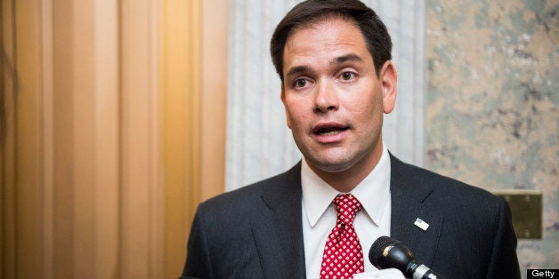 UNITED STATES - MAY 7: Sen. Marco Rubio, R-Fla., speaks with reporters outside of the Senate floor in the Capitol on Tuesday,
