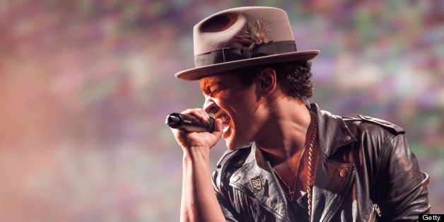 LONDONDERRY, UNITED KINGDOM - MAY 26: Bruno Mars performs on stage on Day 3 of The BBC Radio 1 Big Weekend Festival with his backing band The Hooligans on May 26, 2013 in Londonderry, Northern Ireland. (Photo by Ollie Millington/Redferns via Getty Images)