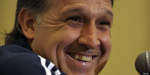 Paraguay's national football team coach Gerardo Martino smiles during a press conference in Buenos Aires on July 18, 2011, ahead of their Copa America semifinal match against Venezuela to be held at the Malvinas Argentinas stadium in Mendoza, Argentina on July 20. AFP PHOTO/Juan Mabromata (Photo credit should read JUAN MABROMATA/AFP/Getty Images)