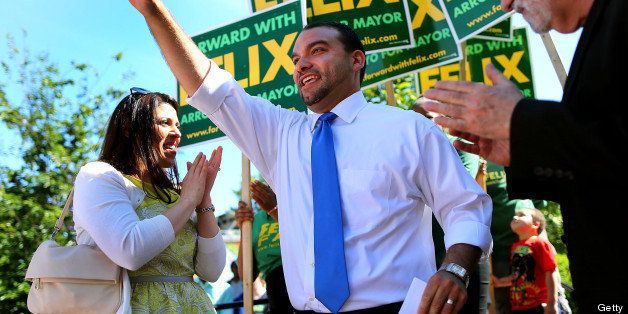 BOSTON - JUNE 15: Boston Mayoral candidate Felix Arroyo kicked off his campaign at Villa Victoria in the South End. He waves from the stage with his wife Jasmine, left. (Photo by John Tlumacki/The Boston Globe via Getty Images)