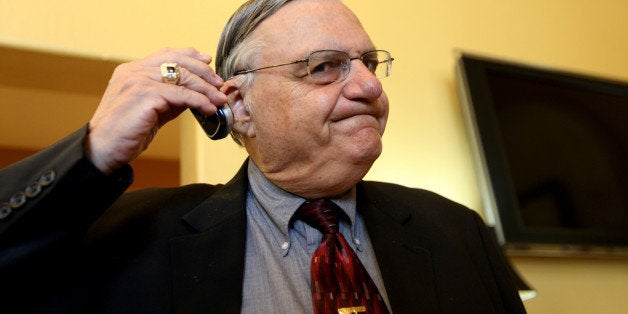 RANCHO BERNARDO, CA - AUGUST 10: Sheriff Joe Arpaio listens to his cell phone during a visit to the Rancho Bernardo Inn on A
