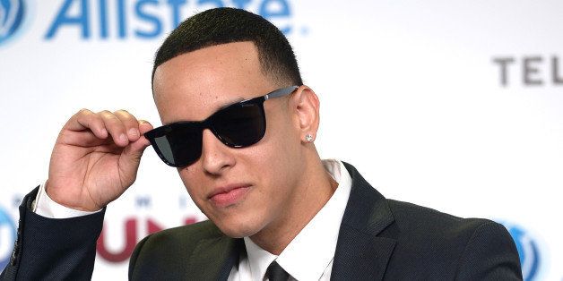 MIAMI, FL - AUGUST 15: Daddy Yankee arrives for Telemundo's Premios Tu Mundo Awards at American Airlines Arena on August 15, 2013 in Miami, Florida. (Photo by Gustavo Caballero/Getty Images)