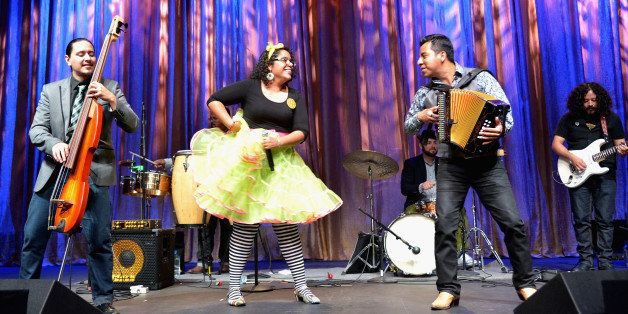 LAS VEGAS, NV - MARCH 21: (L-R) Bassist Alex Bendana, singer La Marisoul, accordionist Jose Carlos and percussionist Miguel Ramirez of the musical group La Santa Cecilia performs on stage during the 20th annual BMI Latin Awards at the Bellagio on March 21, 2013 in Las Vegas, Nevada. (Photo by Lester Cohen/WireImage)