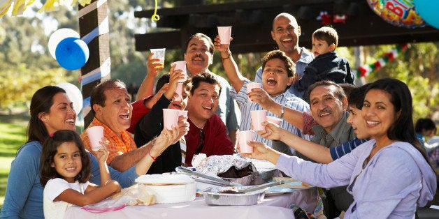 Extended family having party in park