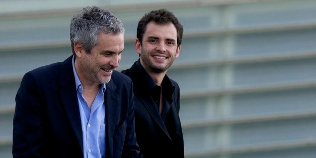 SAN SEBASTIAN, SPAIN - SEPTEMBER 23: (L-R) Alfonso Cuaron and Jonas Cuaron attend 'Gravity' photocall at Kursaal during 61st San Sebastian Film Festival on September 23, 2013 in San Sebastian, Spain. (Photo by Juan Naharro Gimenez/WireImage)