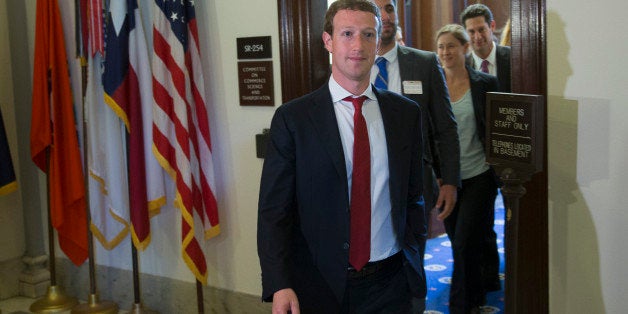 Mark Zuckerberg, founder and chief executive officer of Facebook Inc., leaves a meeting with members of the Senate Committee