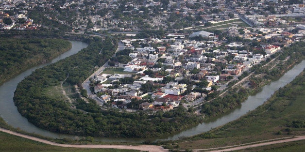 BROWNSVILLE, TX - MAY 21: The Mexican border town of Matomoros is seen on the Rio Grande across the U.S.-Mexico border on Ma