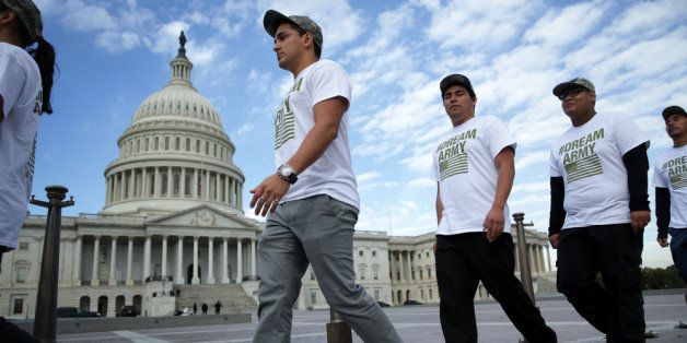 WASHINGTON, DC - OCTOBER 23: (L-R) Lizardo Buleje of San Antonio, Texas, Jorge Tellez of Parker, Colorado, Anthony Corona of Staten Island, New York, and Armando Jimenez of Allen Town, Pennsylvania, march in front of the U.S. Capitol during a rally on immigration reform October 23, 2013 on Capitol Hill in Washington, DC. The Dream Action Coalition held a rally and briefing to discuss 'how the outdated immigration system undermines military readiness, separates military families, and prevents talent from joining its enlisted and officer ranks.' (Photo by Alex Wong/Getty Images)