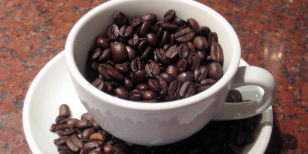 Coffee beans in a cup; taken by me :)