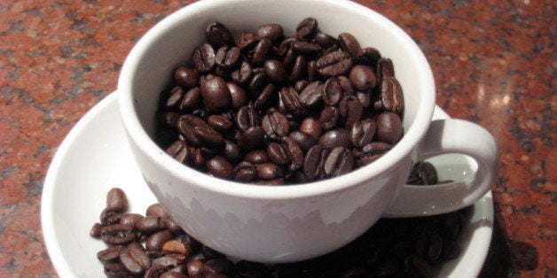 Coffee beans in a cup; taken by me :) 