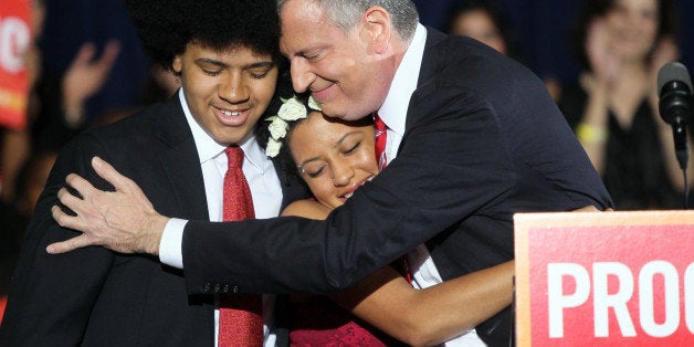 NEW YORK, NY - NOVEMBER 05: (L-R) Dante De Blasio, Chiara De Blasio and Bill DeBlasio celebrate winning the New York City mayoral election on November 5, 2013 in Brooklyn, New York City. (Photo by Steve Sands/WireImage)