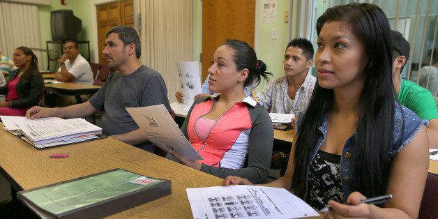 CHELSEA, MA - JULY 23: Adult education students listen at Centro Latino in Chelsea, a suburb where the Latino population has boomed. (Photo by David L Ryan/The Boston Globe via Getty Images)