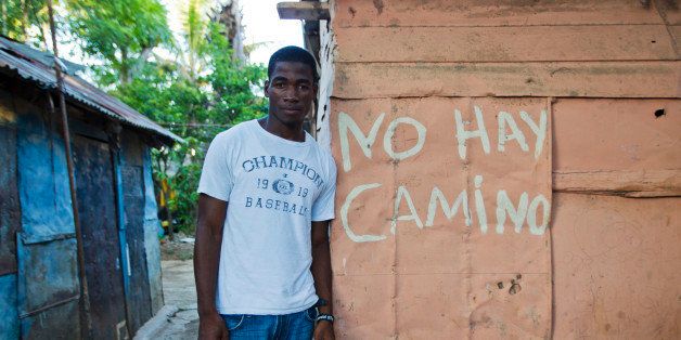 TO GO WITH AFP STORY BY NICANOR LEYBAYuly Paredes Senfa, 23, born in the Dominican Republic of Haitian descent, poses in San Pedro de Macoris, Dominican Republic, on October 6, 2013. A pan-American human rights court began a week-long session on Monday that will include racially-charged cases against the Dominican Republic's expulsion of citizens of Haitian origin. The Dominican constitutional court last month said children born to Haitians who were in the country illegally or in transit are not entitled to Dominican citizenship, retroactive to 1929 -- a decision that could affect 250,000 people. AFP PHOTO/Erika SANTELICES (Photo credit should read ERIKA SANTELICES/AFP/Getty Images)