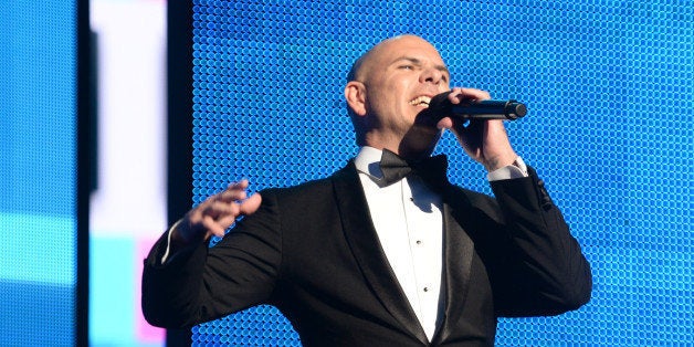 LOS ANGELES, CA - NOVEMBER 24: Host Pitbull speaks onstage during the 2013 American Music Awards at Nokia Theatre L.A. Live on November 24, 2013 in Los Angeles, California. (Photo by Frazer Harrison/AMA2013/FilmMagic)