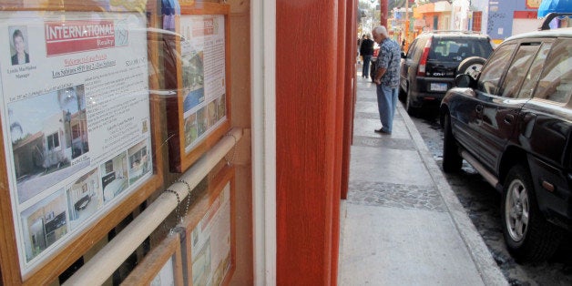 Real estate listings have proliferated in Ajijic, Mexico, a retirement haven for foreigners, amid a spike in violent crime. (
