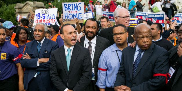 WASHINGTON, DC - OCTOBER 8: (L-R) Rep. Charles Rangel (D-NY), Rep. Luis Gutierrez (D-IL), Rep. Al Green (D-TX), Rep. Keith Ellison (D-MN) and Rep. John Lewis (D-GA) stand with immigration reform supporters as they block First Street NW in front of the U.S. Capitol, in Washington, on October 8, 2013 in Washington, DC. Last week, House Democrats introduced their own immigration reform bill. (Photo by Drew Angerer/Getty Images)