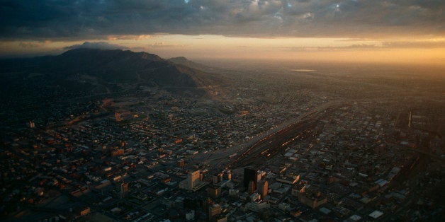 UNITED STATES - APRIL 01: Low sunlight gleams on city of El Paso, El Paso, Texas (Photo by Gordon Gahan/National Geographic/Getty Images)