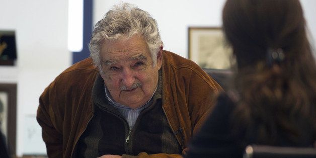 Uruguayan President Jose Mujica answers questions during an interview with Agence France-Presse in Montevideo on August 6, 2013. Mujica said that if marijuana gets out of hand in Uruguay --after the legalization of its production and distribution-- he is prepared to pulling back. AFP PHOTO / Daniel CASELLI (Photo credit should read DANIEL CASELLI/AFP/Getty Images)