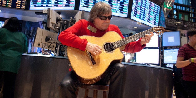 NEW YORK, NY - DECEMBER 23: In this handout photo provided by NYSE Euronext, Representatives from The Make-A-Wish Foundation of Connecticut visit the New York Stock Exchange on December 23, 2011 in New York City. Make-A-Wish Child Katherine Mara rang The Closing Bell joined by legendary musician Jose Feliciano who directly following the bell ringing performed his renowned hit, 'Feliz Navidad'. (Photo by Valerie Caviness/NYSE Euronext via Getty Images)