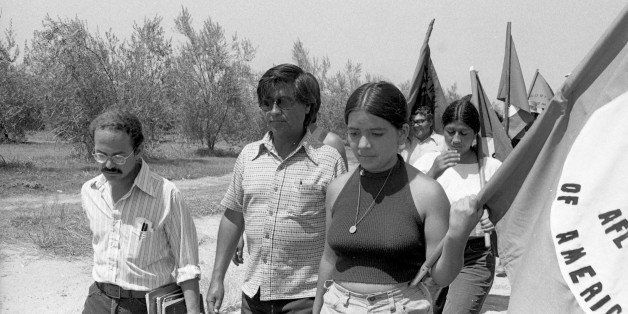 Left to right: Marc Grossman, Cesar Chavez (1927 - 2003), Anna Murgia, and Cesar's daughter Elizabeth Chavez march together during the United Farm Worker's (UFW) 1,000 Mile March, summer 1975. The march was a 59 day trek organized by the UFW, from the Mexican border at San Ysidro to Salinas and then from Sacramento south down the Central Valley to the UFW's La Paz headquarters at Keene, southeast of Bakersfield. Tens of thousands of farm workers marched and attended evening rallies to hear Chavez and organize their ranches. (Photo by Cathy Murphy/Getty Images)