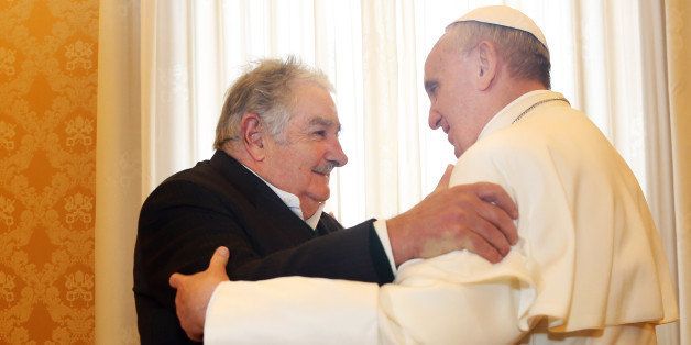VATICAN CITY, VATICAN - JUNE 01: Pope Francis receives President of Uruguay Jose Mujica at his private library on June 1, 2013 in Vatican City, Vatican. President Mujica is currently on a two-week international tour taking him to China, Spain and Italy. (Photo by Vatican Pool/Getty Images)