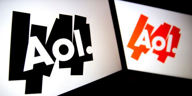 The Aol Inc. logo is displayed on laptop computers arranged for a photograph in Washington, D.C., U.S., on Monday, Nov. 4, 2013. Aol Inc. is expected to release earnings data on Nov. 5. Photographer: Andrew Harrer/Bloomberg via Getty Images