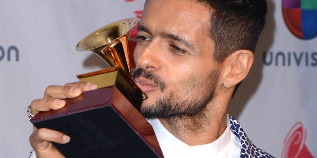 LAS VEGAS, NV - NOVEMBER 21: Singer Draco Rosa poses backstage at the 14th Annual Latin GRAMMY Awards at Mandalay Bay Events Center on November 21, 2013 in Las Vegas, Nevada. (Photo by C Flanigan/Getty Images)