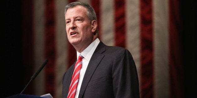 NEW YORK, NY - FEBRUARY 10: New York City Mayor Bill de Blasio gives the State of the City address at La Guardia Community College on February 10, 2014 in the Long Island City section of the Queens borough of New York City. In his first address as Mayor of New York de Blasio plans to outline his vision for fighting the widening income inequality gap and intends to urge lawmakers to raise the minimum wage. (Photo by John Moore/Getty Images)