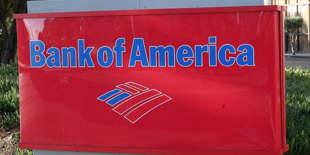 OAKLAND, CA - JANUARY 15: A sign is posted in front of a Bank of American branch office on January 15, 2014 in Oakland, California. Bank of American beat analysts expectations and reported a surge in fourth quarter earnings with profits of $3.4 billion, or 29 cents a share, compared to $732 million, or 3 cents a share, one year ago. (Photo by Justin Sullivan/Getty Images)