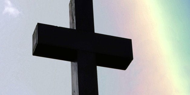 Christian Cross with a rainbow.