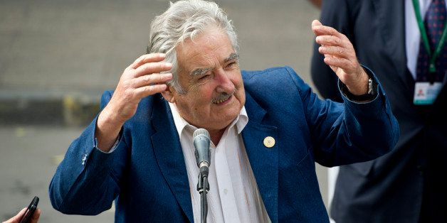 Uruguay's President Jose Mujica speaks to the press after holding a meeting with Chile's President-elect Michelle Bachelet in Santiago, on March 10, 2014. Socialist Michelle Bachelet is to be sworn in on March 11 in Valparaiso, city 120 km west of the Chilean capital. AFP PHOTO / MARTIN BERNETTI (Photo credit should read MARTIN BERNETTI/AFP/Getty Images)