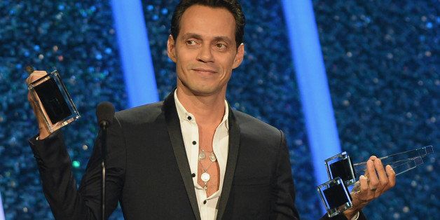 MIAMI, FL - APRIL 24: Marc Anthony accepts an award onstage during the 2014 Billboard Latin Music Awards at Bank United Center on April 24, 2014 in Miami, Florida. (Photo by Larry Marano/Getty Images)