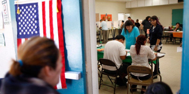 LOS ANGELES, CA - NOVEMBER 6: People vote at a polling place in the heavily Latino East L.A. area during...