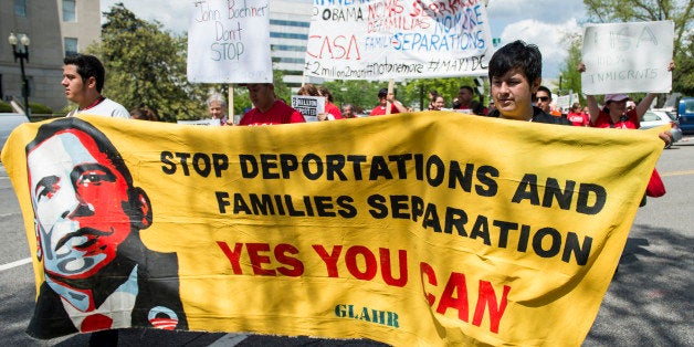 UNITED STATES - MAY 1: Immigration reform advocates march to the U.S. Capitol then on to the White House on May 1, 2014, calling on Congress and President Obama to stop deportations and pass immigration reform. (Photo By Bill Clark/CQ Roll Call)