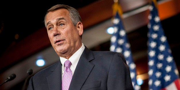 U.S. House Speaker John Boehner, a Republican from Ohio, speaks during a news conference at the Capitol in Washington, D.C., U.S., on Thursday, Feb. 6, 2014. Boehner said it would be difficult to pass an immigration bill because fellow Republicans dont trust President Barack Obama to implement the law, a position that shrinks chances for House action this year. Photographer: Pete Marovich/Bloomberg via Getty Images 