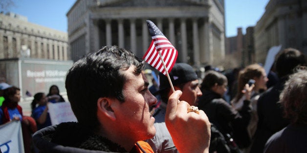 NEW YORK, NY - APRIL 10: Immigrant rights activisits demonstrate during a 'National Day of Action' on April 10, 2014 in New York City. Hundreds of people organized by the New York Immigration Coalition demonstrated to press Congress to pass immigration reform and for the Obama administration to stop mass deportations, almost 2 million people since 2008.(Photo by John Moore/Getty Images)