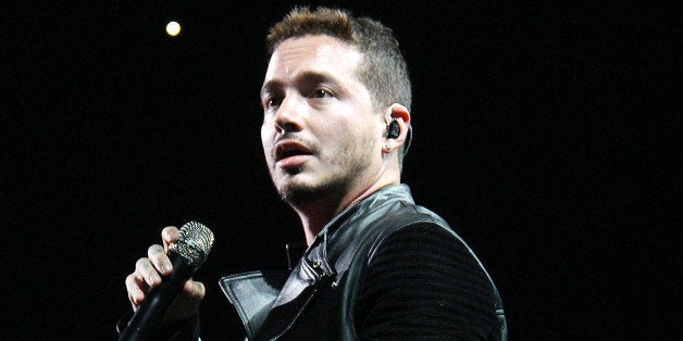 NEW YORK, NY - SEPTEMBER 25: J. Balvin performs at Enrique Iglesias and Pitbull in Concert at Madison Square Garden on September 25, 2014 in New York City. (Photo by Laura Cavanaugh/Getty Images)