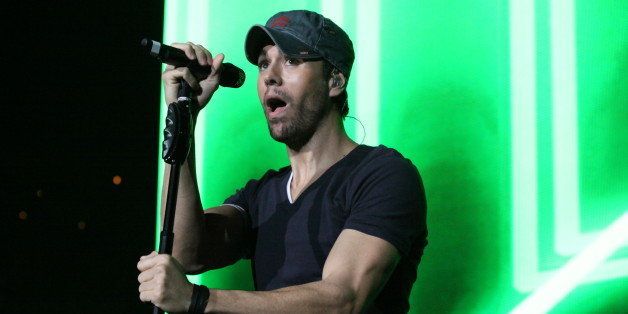 Enrique Iglesias performs as part of The Power 96.1 Jingle Ball 2012 at Philips Arena on Wednesday, Dec. 12, 2012, in Atlanta. (Photo by Robb Cohen/Robbs Photos/Invision/AP)