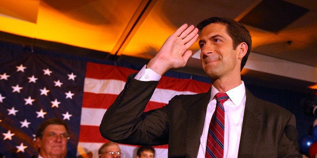 NORTH LITTLE ROCK, AR - NOVEMBER 04: U.S. Rep. Tom Cotton (R-AR) and republican U.S. Senate elect in Arkansas salutes supporters during an election night gathering on November 4, 2014 in Little Rock, Arkansas. Cotton defeated two-term incumbent democrat U.S. Sen. Mark Pryor (D-AR). (Photo by Justin Sullivan/Getty Images)