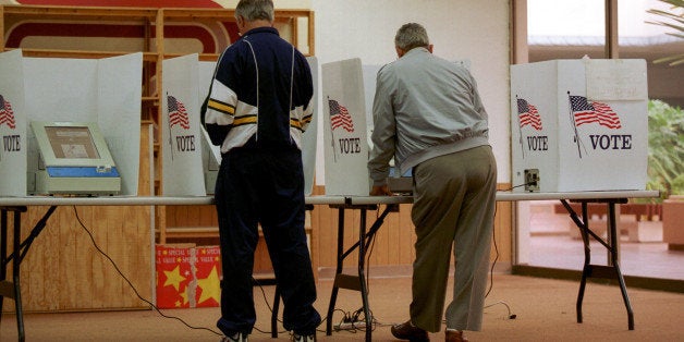 380728 02: Residents of El Paso, Texas cast their ballot for president of the United States in early voting, October 23, 2000. The state of Texas has early voting that must be conducted for all elections. In most elections, early voting by personal appearance begins on the 17th day before Election Day and ends on the 4th day before Election Day. (Photo by Joe Raedle/Newsmakers)