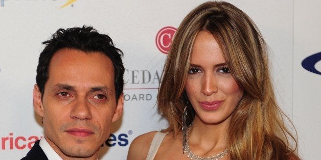 Singer Marc Anthony and model Shannon de Lima pose on arrival for the 27th annual Sports Spectacular in Los Angeles on May 20