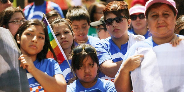 WASHINGTON, DC - JULY 28: United We Dream activists participate in a rally in front of the White House July 28, 2014 in Washington, DC. The activists urged President Obama not to deport the parents of DREAMers, children who brought illegally to the U.S. and eligible for the Obama Administrations 'Dream Act' initiative . (Photo by Alex Wong/Getty Images)