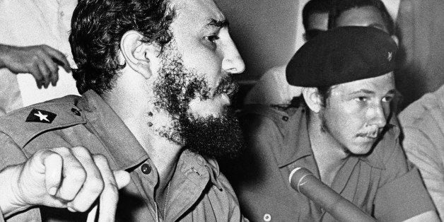 The Cuban government of Premier Fidel Castro, left, seen in an undated photo, intensified a news blackout in the face of reports of the arrest of civilians and Army men in a move to smash a military revolt against the revolutionary regime. At right is Castro's brother Raul, commander in chief of the armed forces. (AP Photo)