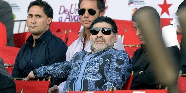 Argentiniean former football player Diego Maradona attends the commemoration of the 190 years of the Battle of Ayacucho and grade promotion ceremony of the Bolivarian National Armed Forces at the National Pantheon in Caracas, on December 9, 2014. AFP PHOTO/FEDERICO PARRA (Photo credit should read FEDERICO PARRA/AFP/Getty Images)