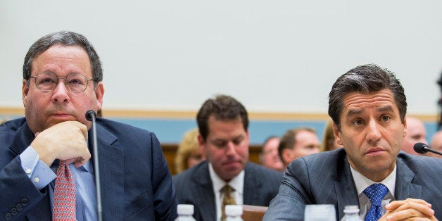 WASHINGTON, DC - MAY 8: (L-R) David L. Cohen, executive vice president of Comcast, and Robert D. Marcus, chairman and CEO of Time Warner Cable, testify during a House Judiciary Committee hearing on the proposed merger of Time Warner Cable and Comcast, on Capitol Hill, May 8, 2014 in Washington, DC. The proposed merger would combine the two largest U.S. cable companies and give Comcast about 30 million subscribers in the United States. (Photo by Drew Angerer/Getty Images)