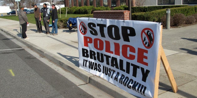 In this Feb. 18, 2015 photo, a protest sign is displayed in front of City Hall in Pasco, Wash., the city where Antonio Zambra