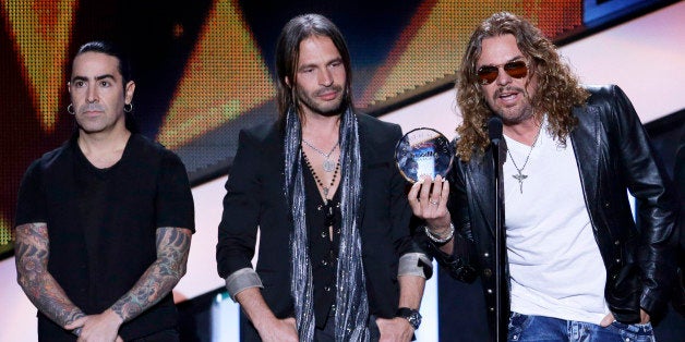 Mana receives the Billboard Spirit of Hope Award at the Latin Billboard Awards in Coral Gables, Fla., Thursday April 25, 2013