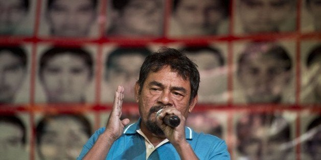 Felipe de la Cruz, father of one of the 43 missing students, speaks during a press conference in Mexico city, on January 27, 2015. Mexico's Attorney General Jesus Murillo Karam said the investigation gave them 'the legal certainty that the students were killed'. Witness and expert testimony 'have allowed us to... come to the conclusion beyond a doubt that the students were abducted and killed, before being incinerated and thrown into the San Juan river, in that order,' he said. AFP PHOTO / RONALDO SCHEMIDT (Photo credit should read RONALDO SCHEMIDT/AFP/Getty Images)